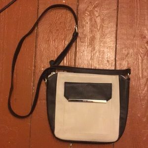 Back and grey handbag: brand is “Nine West”